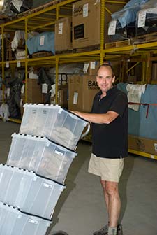 worker with a hand truck